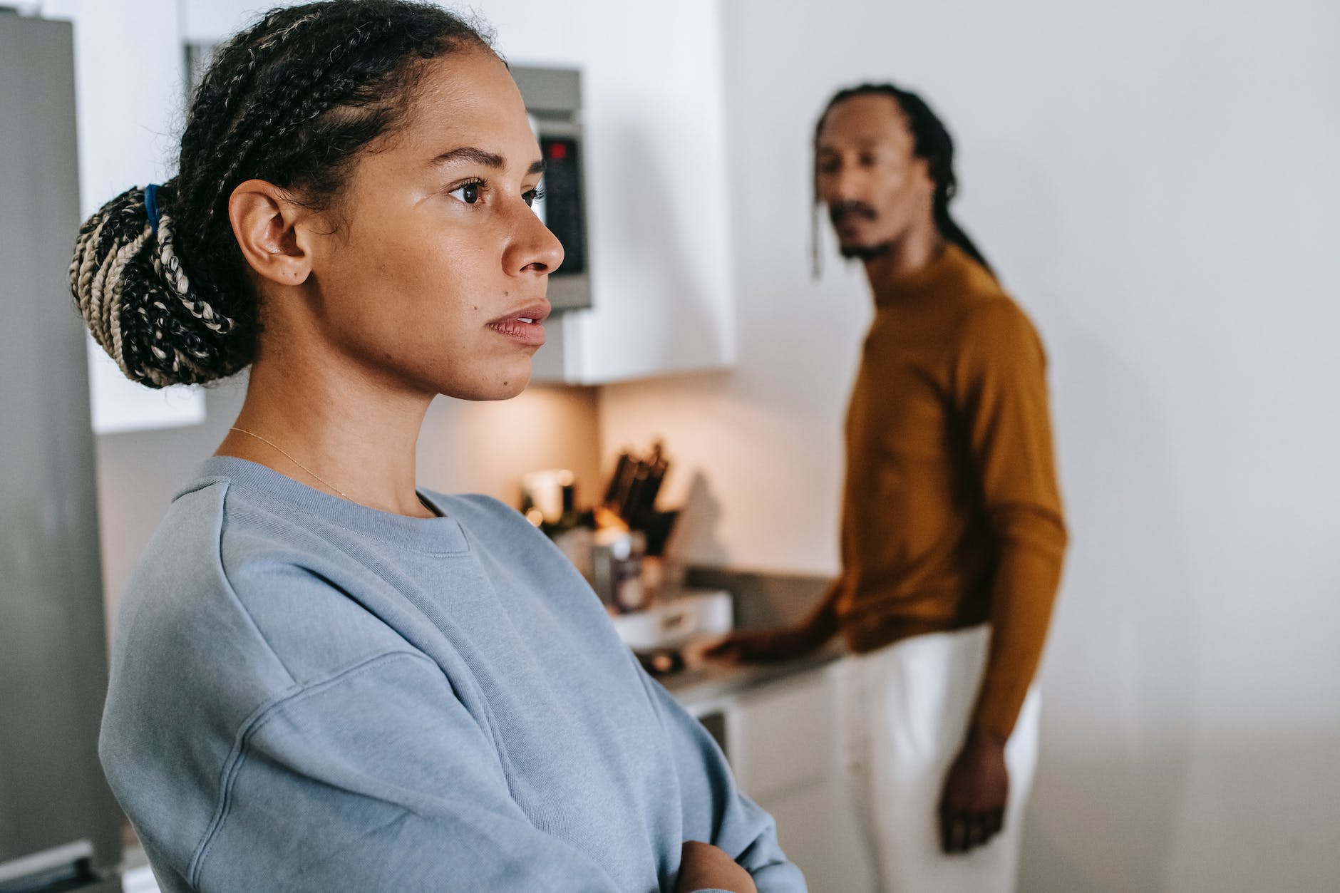 african american couple arguing at home